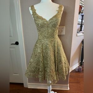 Sherri Hill gold size 4 with rhinestones - loads of sparkle!